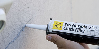 Filling cracks in stucco